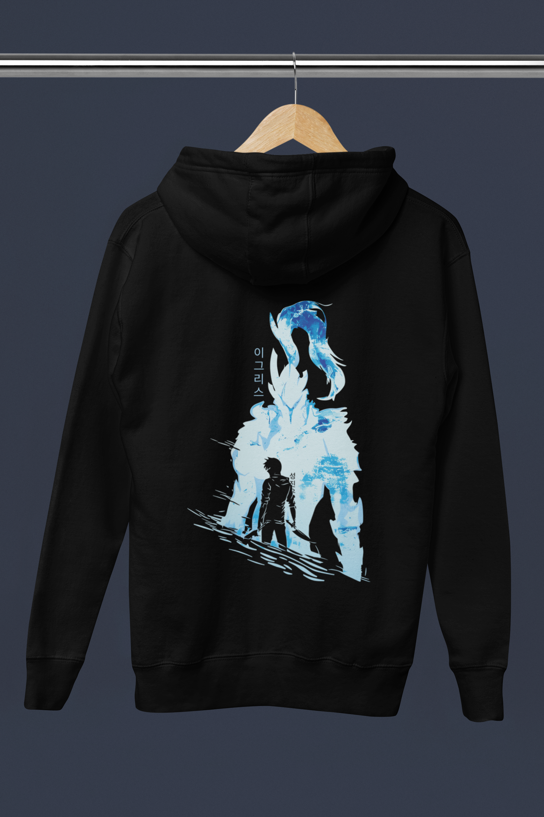 Black hoodie with a blue and white graphic on the back, hanging on a wooden hanger against a dark background.